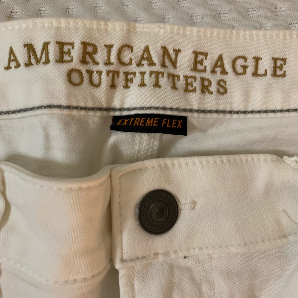 American Eagle Extreme Flex white ripped jeans